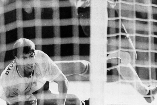 Colombia's Andrés Escobar watches a missed shot by the U.S.'s Eric Wynalda during the teams' 1994 World Cup match. Associated Press