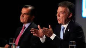 Santos (right) and Zuluaga during recent television debate