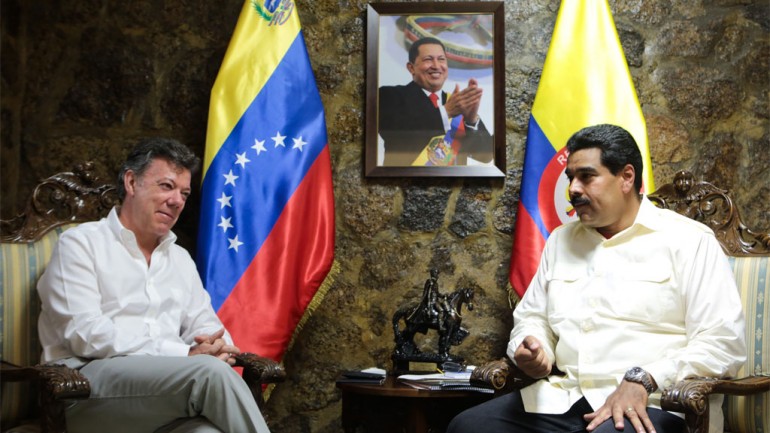 Santos (left) and Maduro to meet on Monday